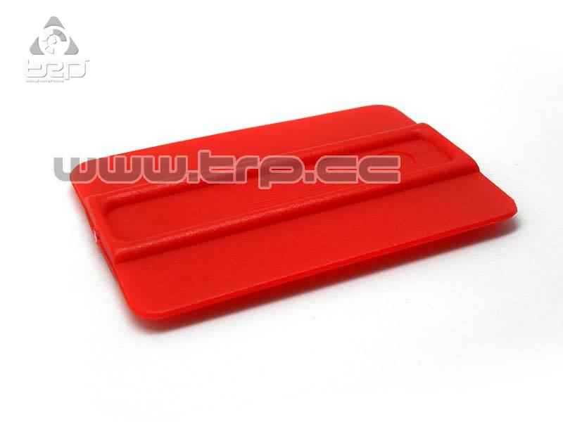 Spatula or soft scraper to apply vinyl