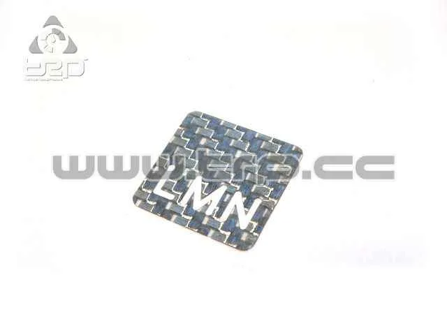 Decorative Carbon fiber plate LMN logo.